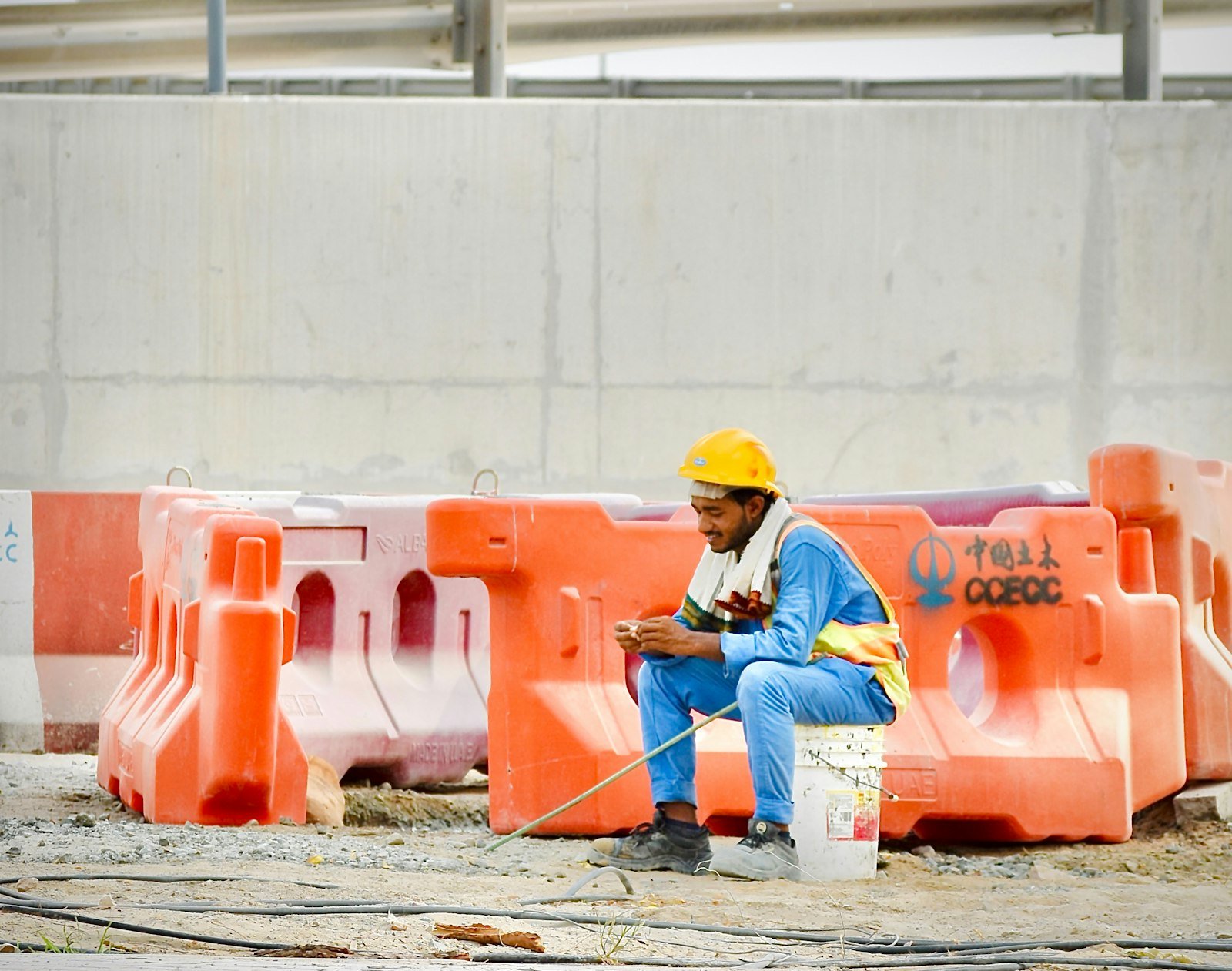 Civil engineer and foreman reviewing project plans on site